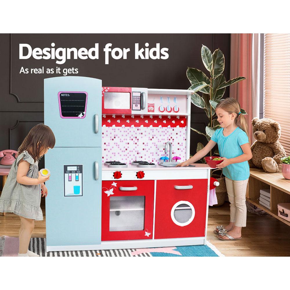 Keezi Kids Kitchen Set featuring a colorful wooden play kitchen with oven, microwave, and fridge, designed for pretend cooking play.